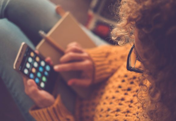 Woman searching for information on her phone