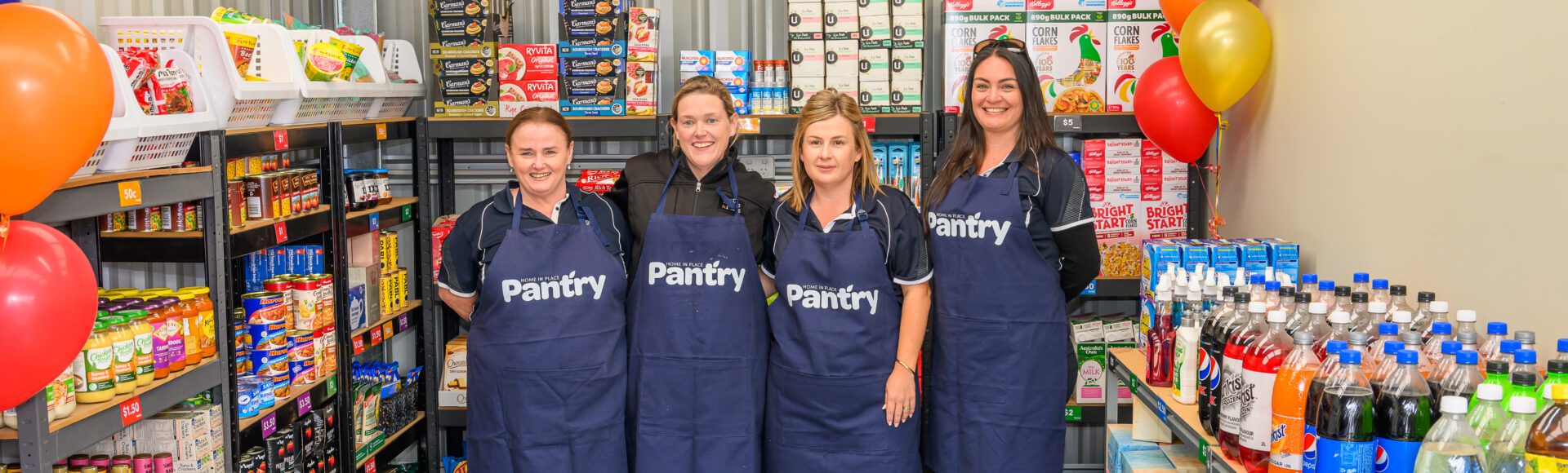 Four women in a grocery store
