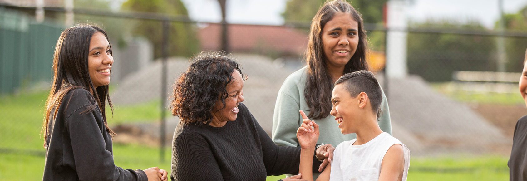 Aboriginal family mother, son and two daughters