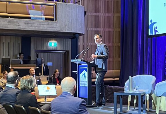 NSW Premier Chris Minns at the podium addressing the 2025 Housing Conference