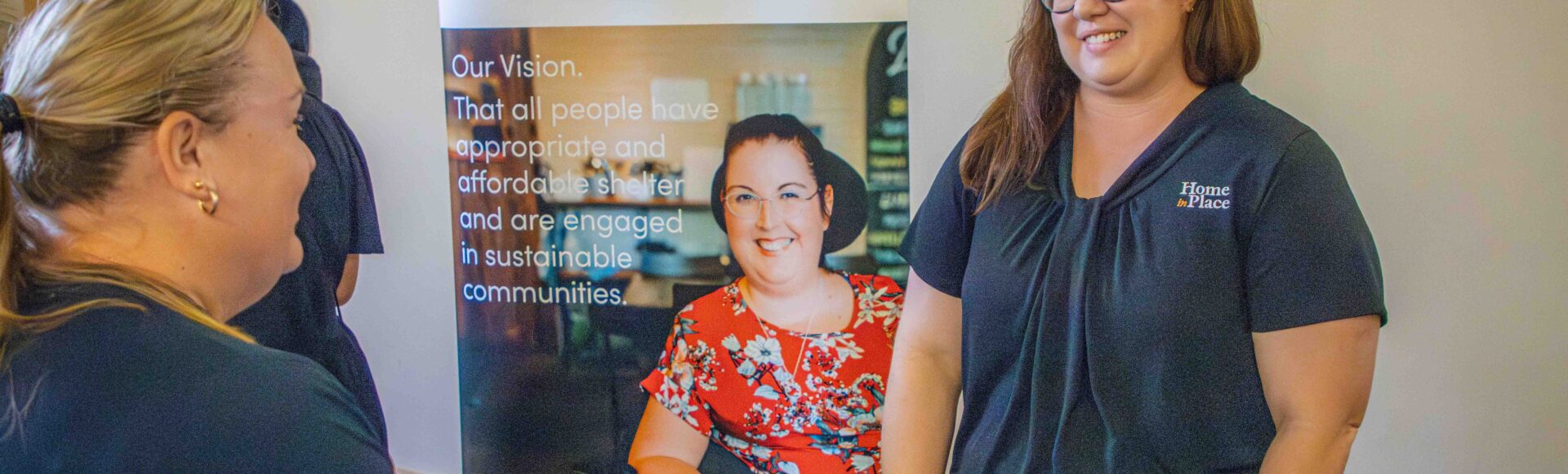 Home in Place staff members at a housing expo
